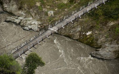A white border painted on a suspended bridge delineates Azad Kashmir from Jammu and Kashmir