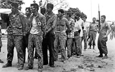 Invaders surrender to Cuban soldiers. (April 20, 1961)