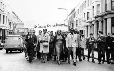 Claudia Jones leads protest against immigration act