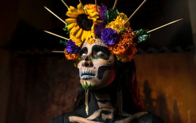 woman in traditional dia de los muertos makeup