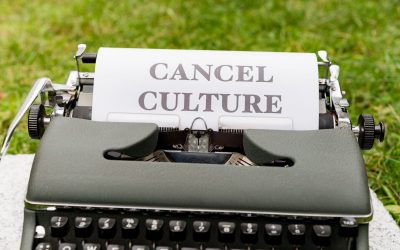 a typewriter with the words cancel culture on it