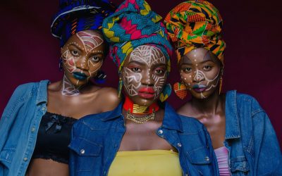 three women with face paints