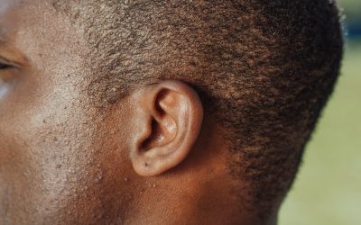 man s ear in close up photography